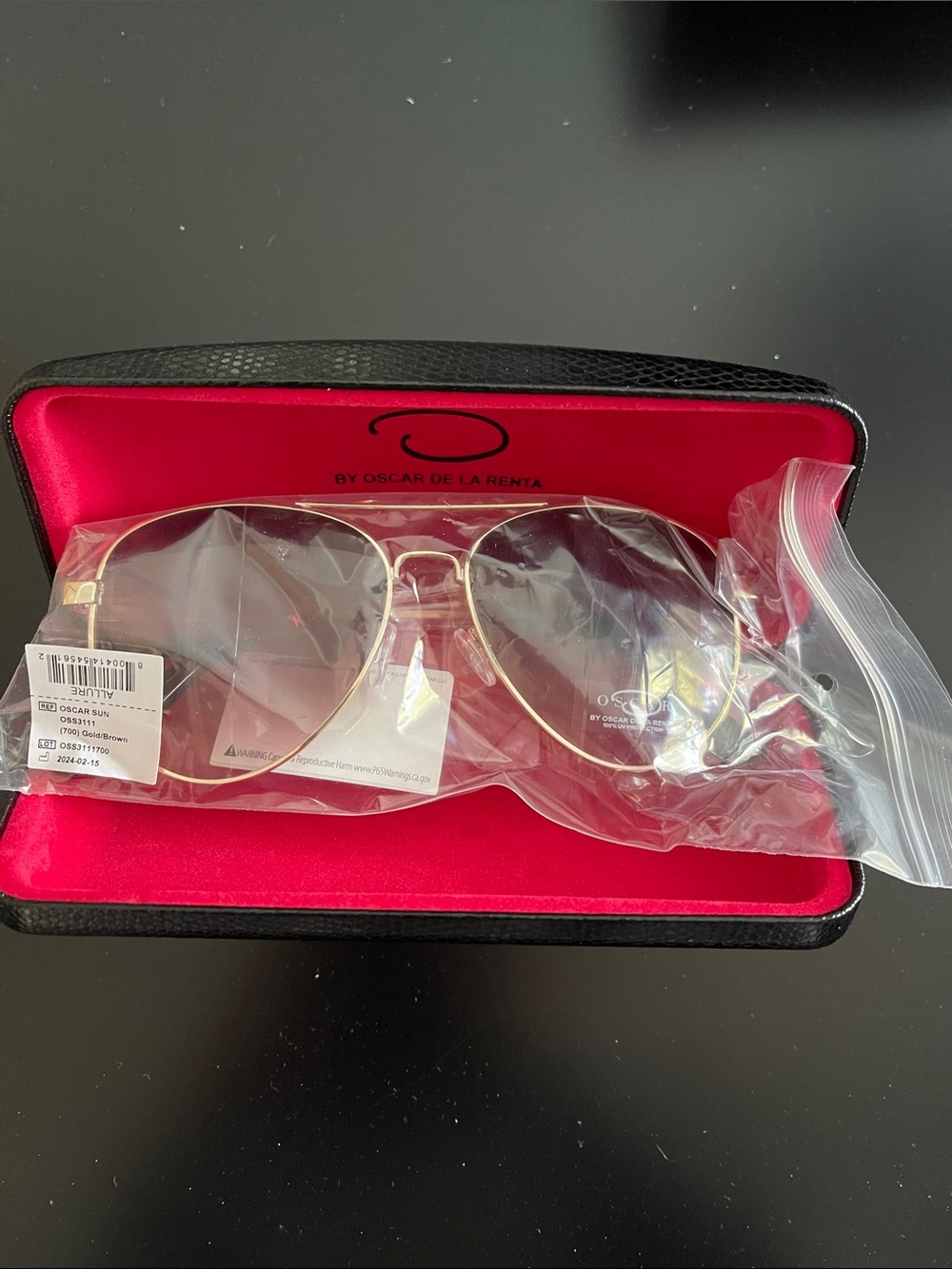 Oscar de la Renta Gold Aviator Sunglasses with Pink-Tinted Lenses